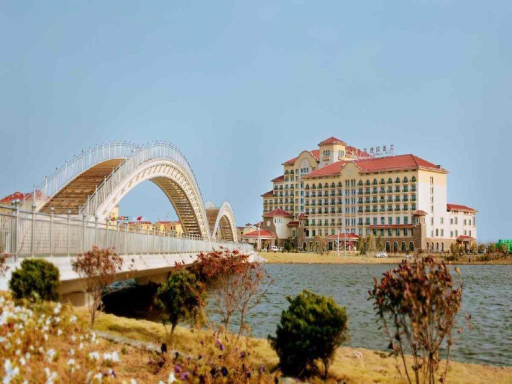 Haiyang Shenglong Jianguo Hotel Fengcheng  Exterior photo