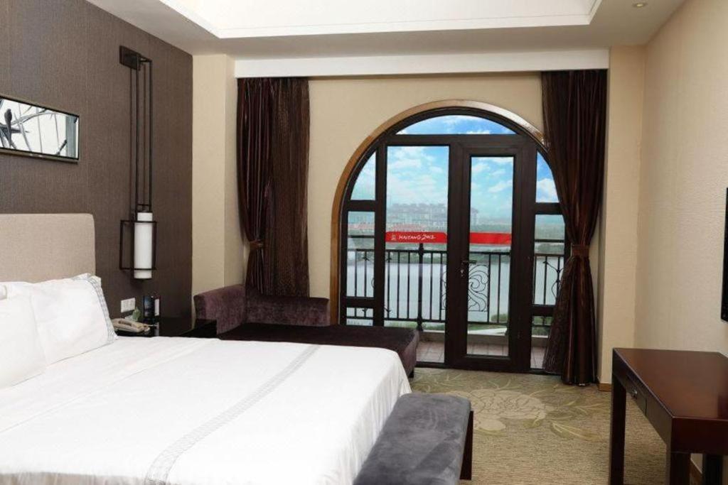 Haiyang Shenglong Jianguo Hotel Fengcheng  Exterior photo